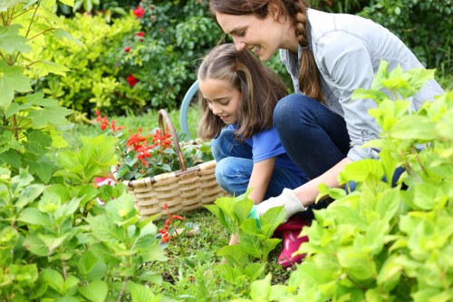 Gardener team arriving at a garden site with equipment